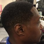 Image of haircut: short back and sides fade with shaped hairline